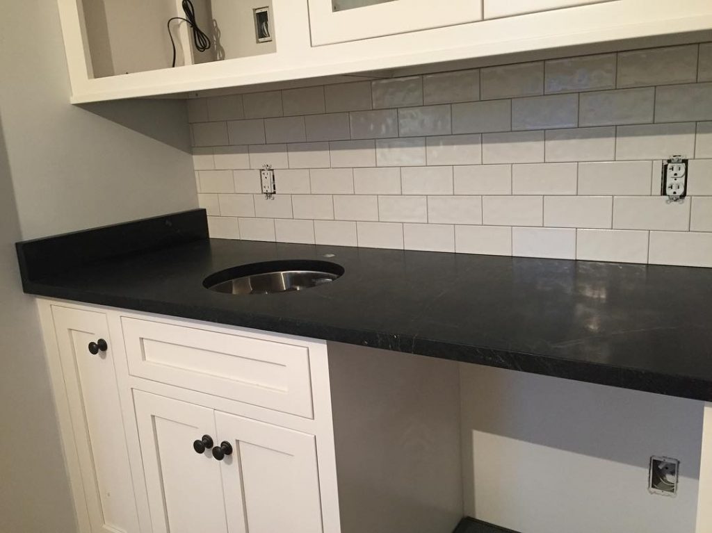 dark counter with white tiles